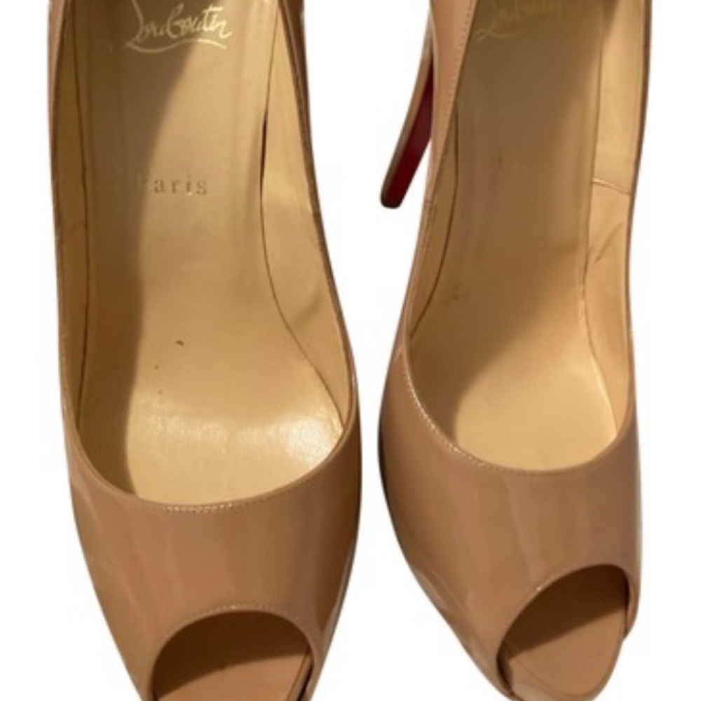 Louboutin peep toe pumps